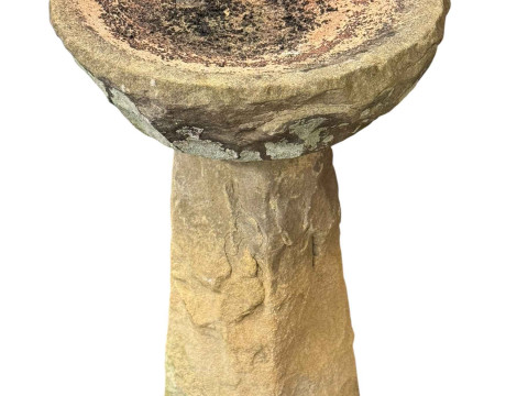 Weathered stone bird bath, 61cm by 36cm diameter.