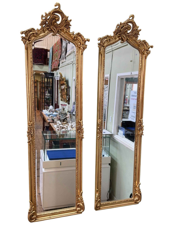 Pair rectangular arched top gilt framed bevelled wall mirrors, 175cm by 54cm.