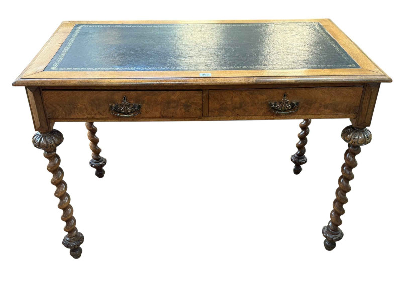 19th Century walnut two drawer writing table on twist legs, 73.5cm by 107cm by 60.5cm.