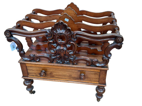 Victorian mahogany three division Canterbury with base drawer on turned...