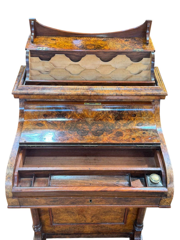Victorian burr walnut piano top Davenport having elevating stationery compartment, slide out writing surface and four side drawers, 92cm by 59cm by 52cm.