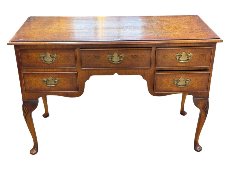 Burr walnut, feather and crossbanded five drawer writing desk on cabriole legs, 75cm by 111cm by 52cm.