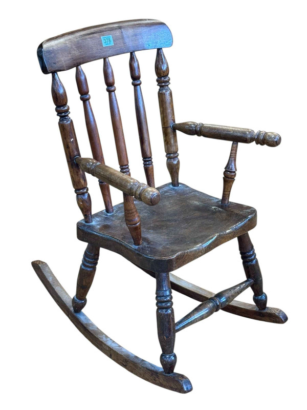 Victorian farmhouse style child's rocking chair.