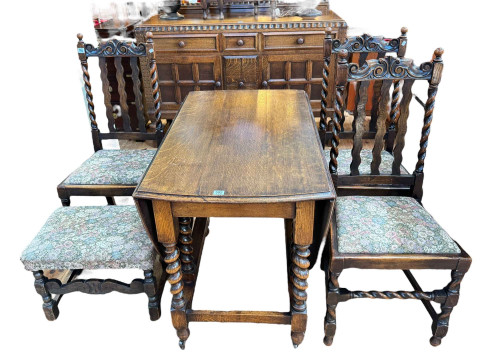 Early 20th Century oak dining furniture comprising two door sideboard...