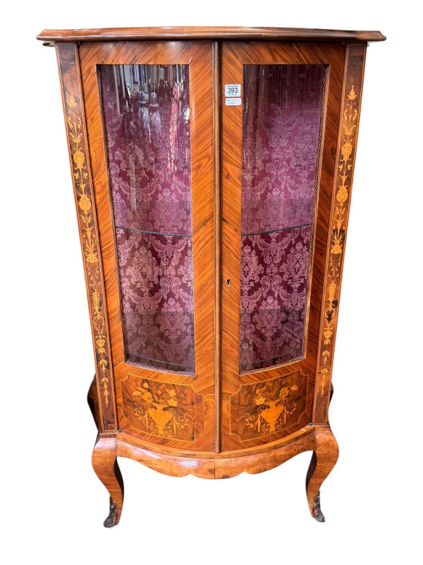 Continental marquetry inlaid two door serpentine front vitrine, 140cm by 84cm by 43cm.
