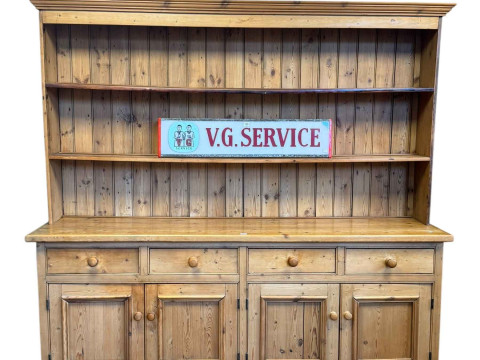 Pine dresser, the two tier shelf back above a base of four drawers and...