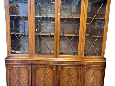 Mahogany cabinet bookcase having four astragal glazed doors enclosing...