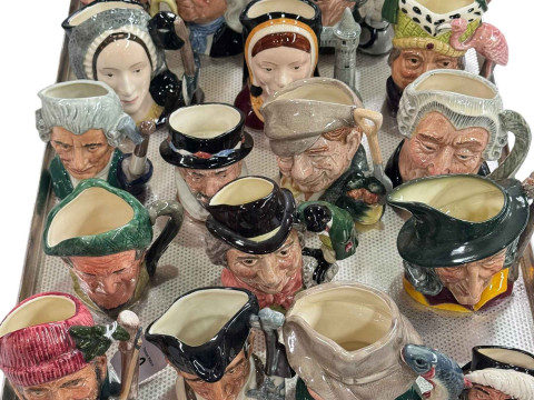 Collection of twenty two Royal Doulton small character jugs.