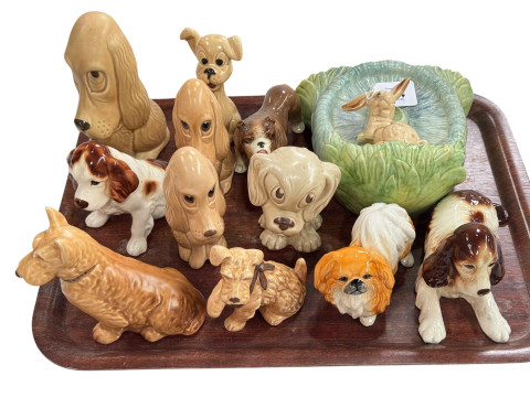 Collection of eleven Sylvac Dogs and Rabbit wall pocket.