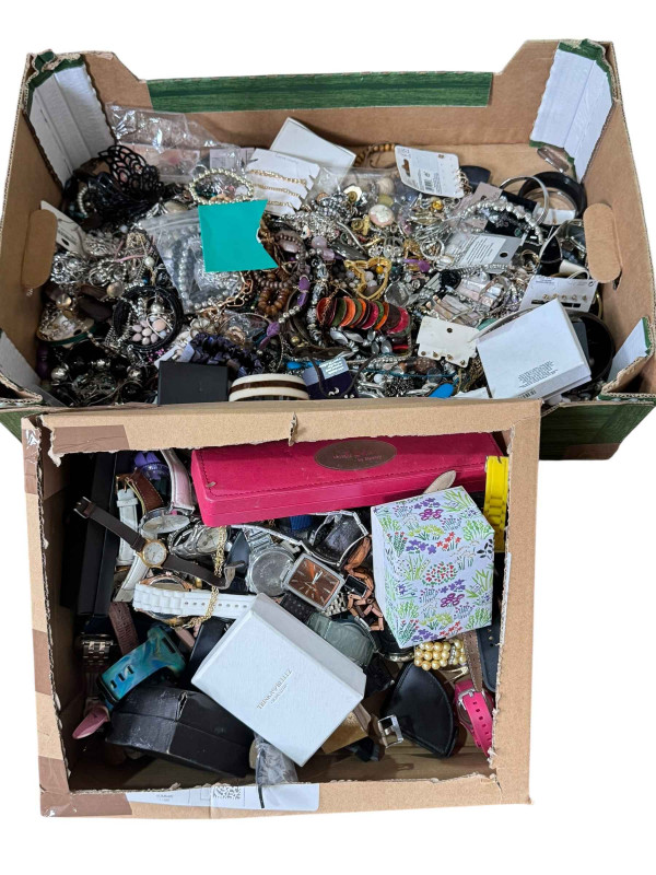 Two boxes of costume jewellery.
