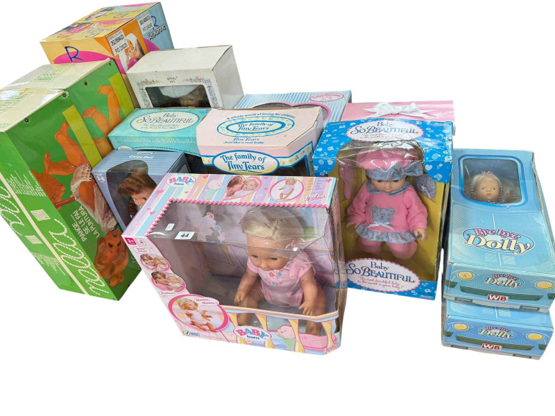 Collection of boxed dolls including Baby Born, Tiny Tears, Fisher Price, etc.