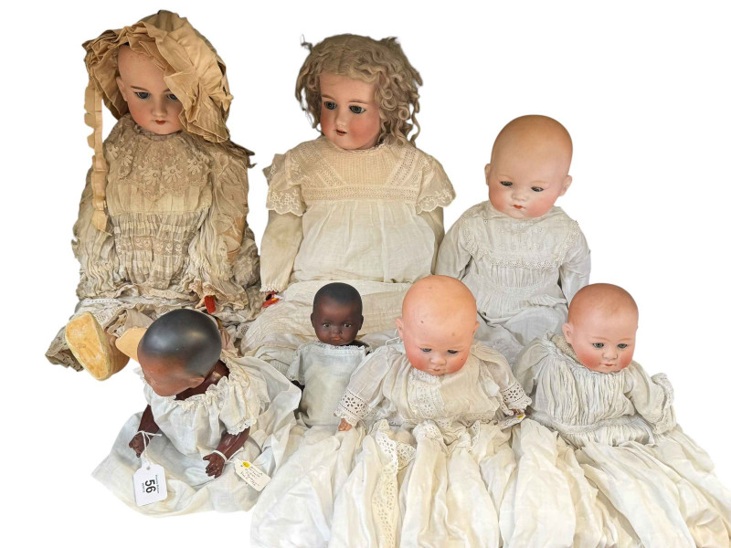 Collection of vintage dolls including Armand Marseille baby, Heubad baby, wooden body doll, etc.