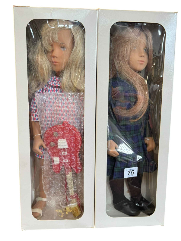 Two limited edition Sasha dolls 'Kiltie' and 'Harlequin' with guitar, boxed.