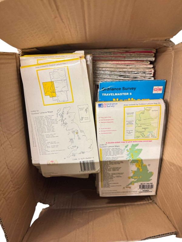 Collection of books and maps.