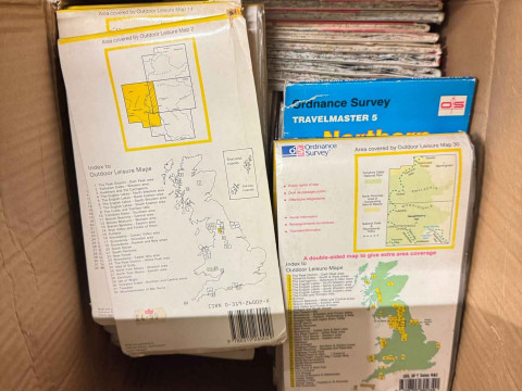 Collection of books and maps. thumbnail