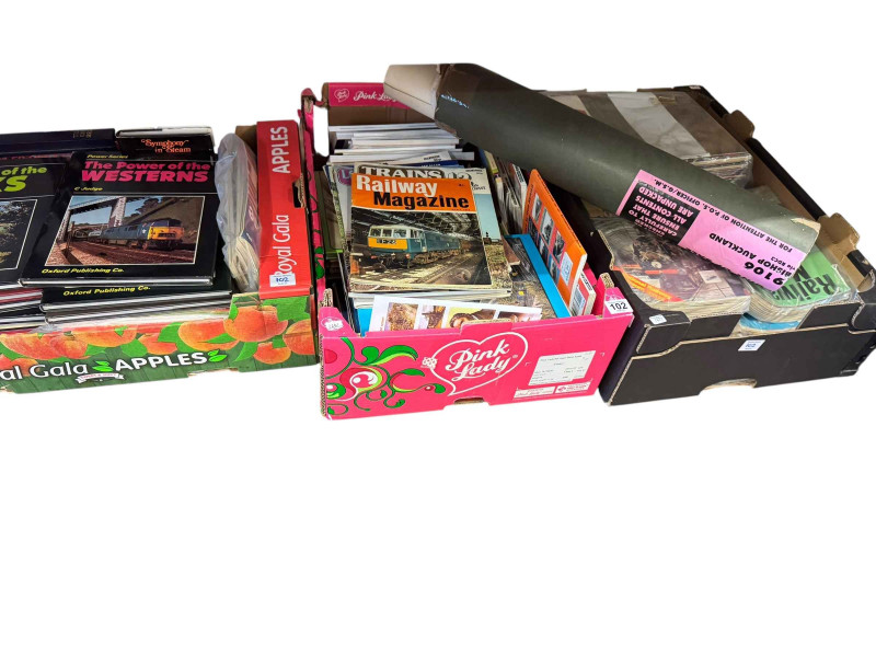 Five boxes of train books and magazines.