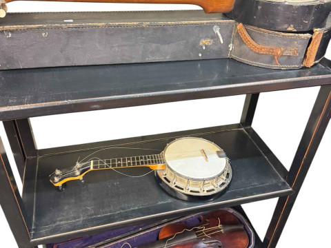 Collection of banjos in cases, violin with bow in case, etc. thumbnail