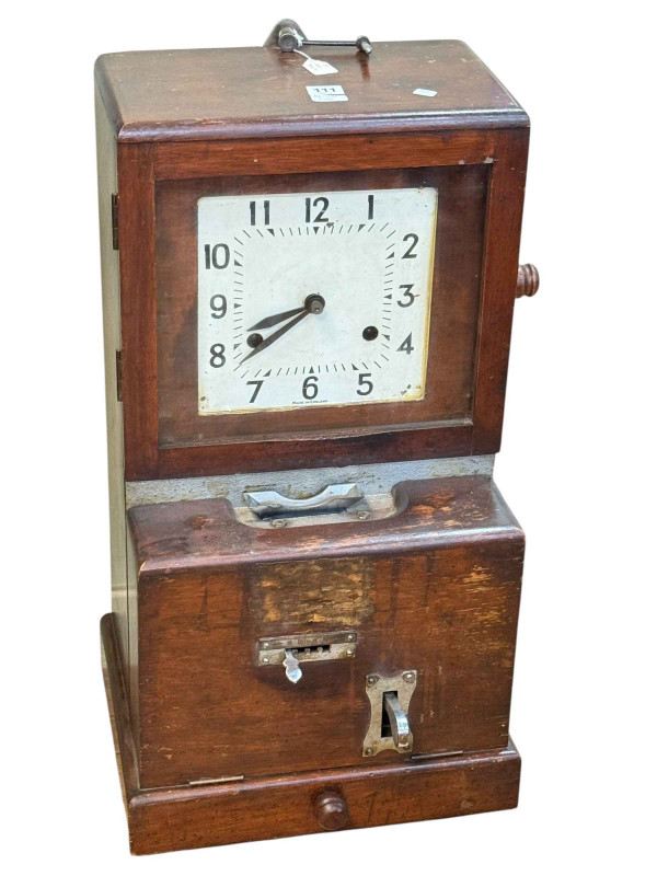Early 20th Century clocking in clock and key, 72cm by 39cm by 31cm.