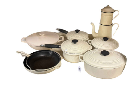 Collection of Le Creuset pans.