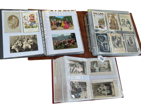 Collection of postcards albums including military (comic, patriotic, artist...
