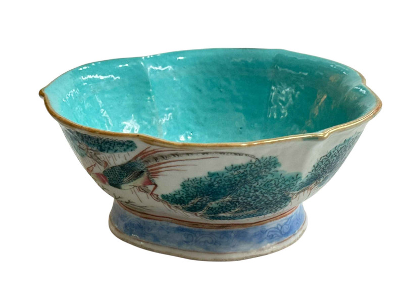 Chinese turquoise bowl decorated with continuous landscape and mythical birds, 17cm diameter.