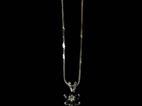 Sapphire and diamond white gold pendant with 14k gold chain.