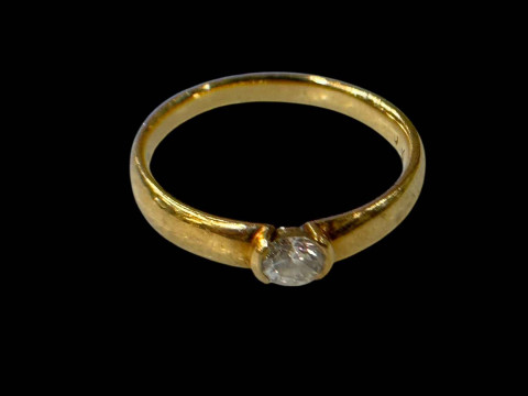 Diamond solitaire 18 carat gold ring, size R.