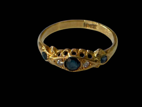 Sapphire and diamond 18 carat gold ring, size J/K.