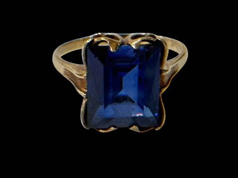 10k gold ring set with rectangular cut sapphire, size S/T.