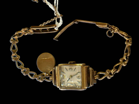 Ladies 18k gold wristwatch with 9 carat gold bracelet.