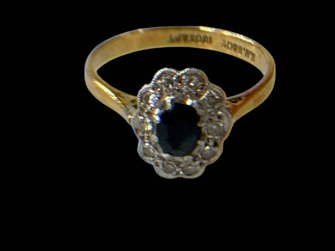 Sapphire and diamond 18 carat gold and platinum ring, size N.