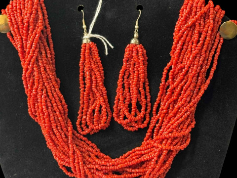 Coral multi-strand necklace (approximately 80cm length), and earrings.