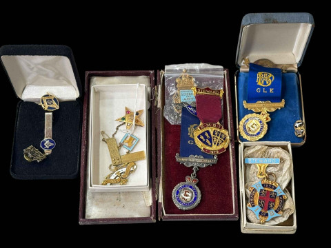 Collection of Masonic jewels including gold and silver.
