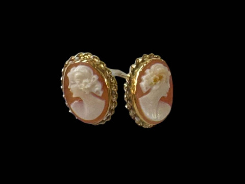 Pair cameo 18 carat gold earrings.