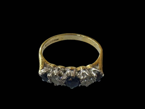 Diamond and sapphire five stone 17 carat gold ring, size K.
