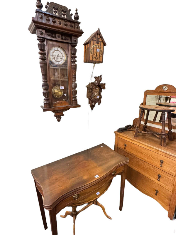 Georgian mahogany fold top tea table of serpentine form, Webber oval oak turned leg stool, oval walnut pedestal coffee table, Victorian walnut Vienna wall clock and two cuckoo clocks (6).