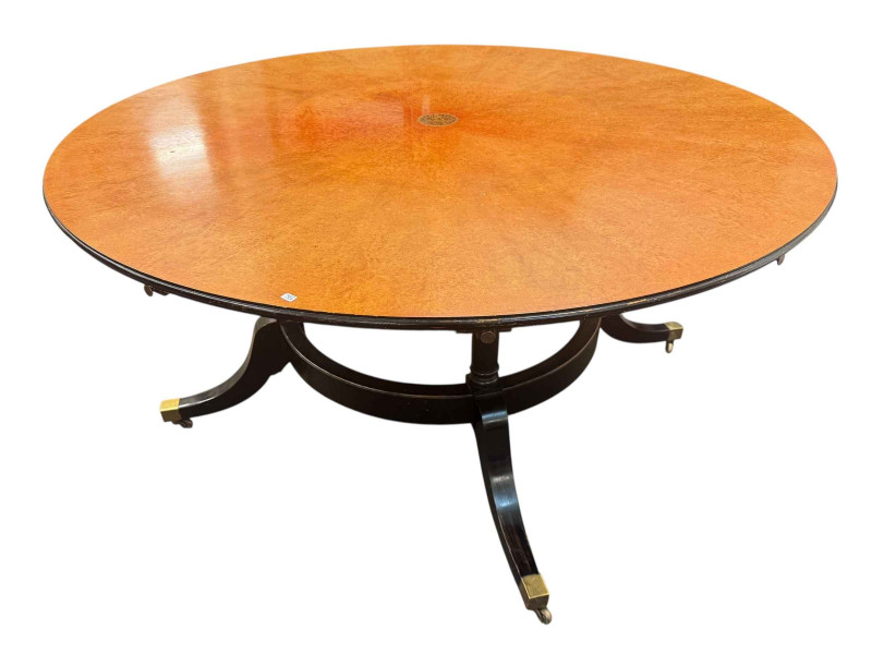 Large burr walnut and ebonised circular extending dining table and five leaves, 214cm diameter including leaves, and set of six dining chairs including pair carvers.