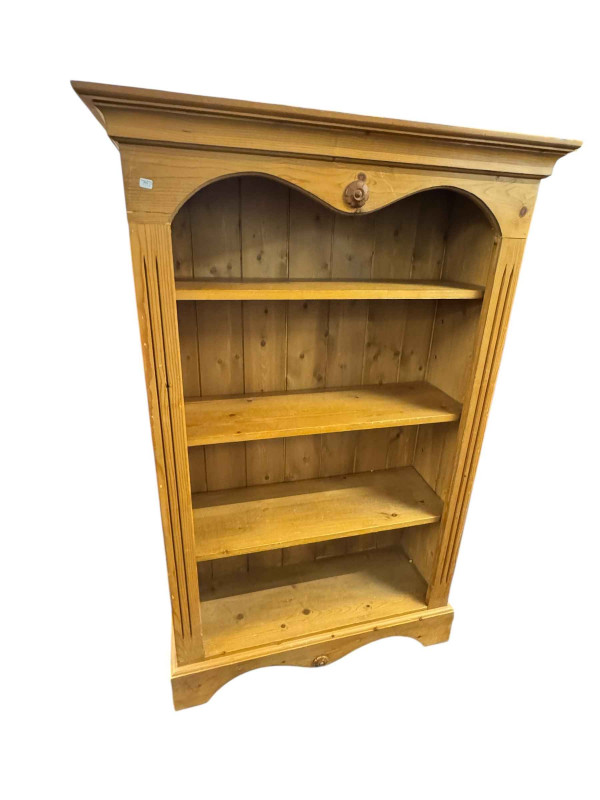 Pine four tier open bookcase with three adjustable shelves, 137cm by 89cm by 32cm.