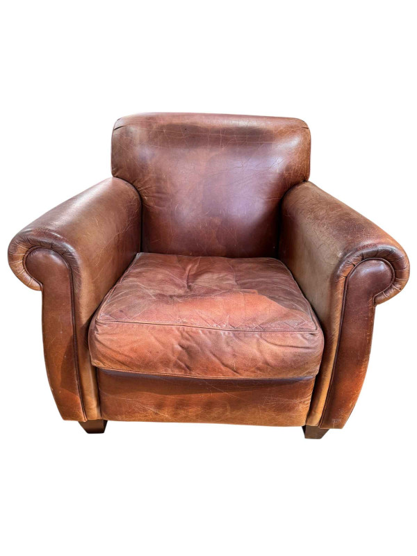 Laura Ashley tan leather armchair.