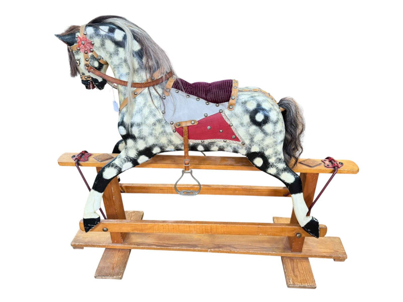 Sponge painted rocking horse on pine safety stand, 127cm by 41cm.