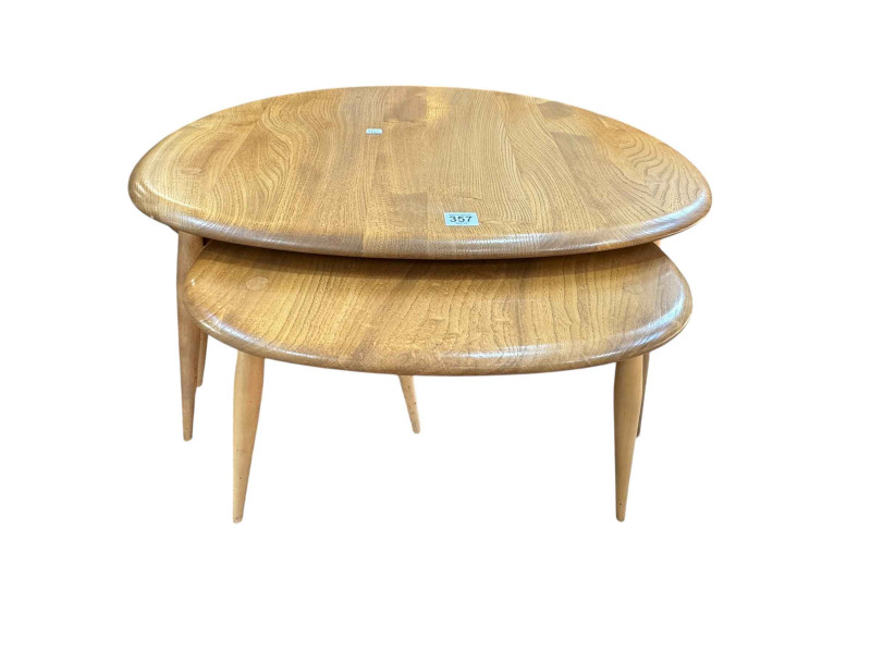Vintage Ercol nest of three pebble tables, largest 40cm by 65cm by 45cm.