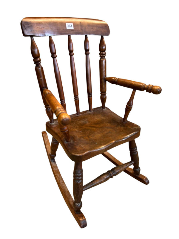 Victorian farmhouse style child's rocking chair.