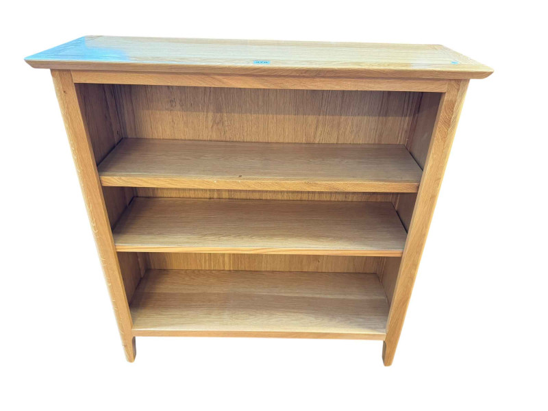 Light oak open bookcase having two adjustable shelves, 90.5cm by 90cm by 30cm.