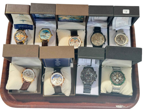 Nine gents wristwatches with military themes.