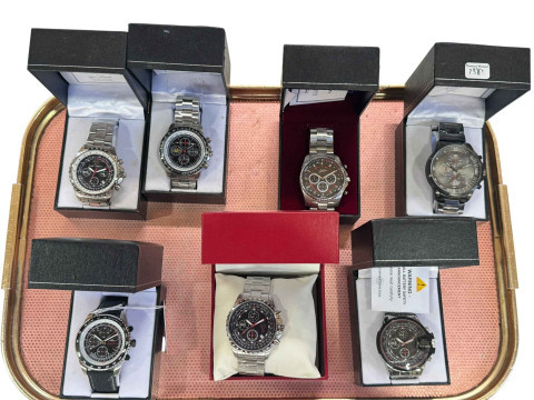 Seven Gents wristwatches with military aircraft themes.
