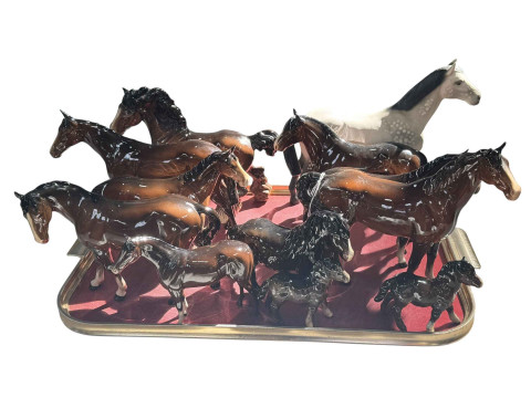 Collection of twelve Beswick, Royal Doulton, Coopercraft horses, etc.