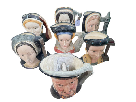 Seven Royal Doulton character jugs (Henry VIII and Six Wives).