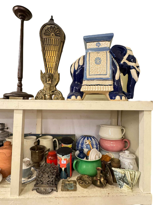 Large collection of decorative pottery, metalwares, elephant table, oil lamp, drawers, etc.