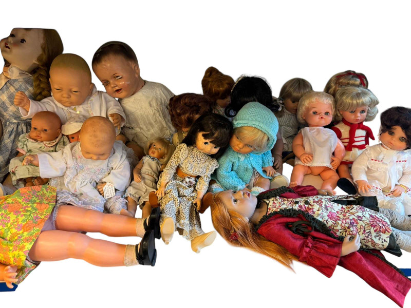 Collection of Mid 20th Century to present dolls, baby dolls and doll collectors books.