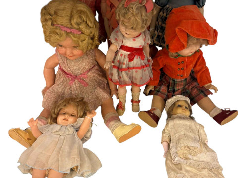 Three Shirley Temple dolls, felt dolls and wax head doll.